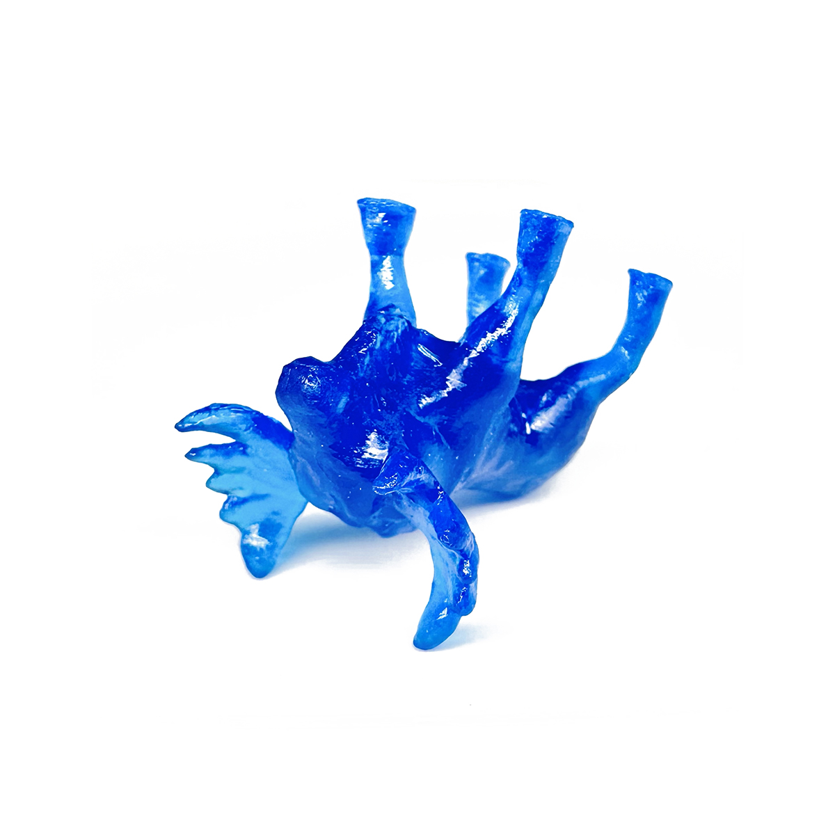 Photo of moose-shaped dice laying on its back